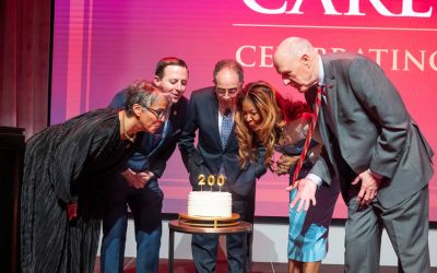 (L-R) Renée McDonald Hutchins, dean, Maryland Carey Law; Bill Ferguson, president, Maryland Senate; Jay Perman, chancellor, University System of Maryland; Tamika Tremaglio, chair, Maryland Carey Law Board of Visitors; and Bruce Jarrell, president, University of Maryland, Baltimore, blow out candles on a 200th birthday cake.